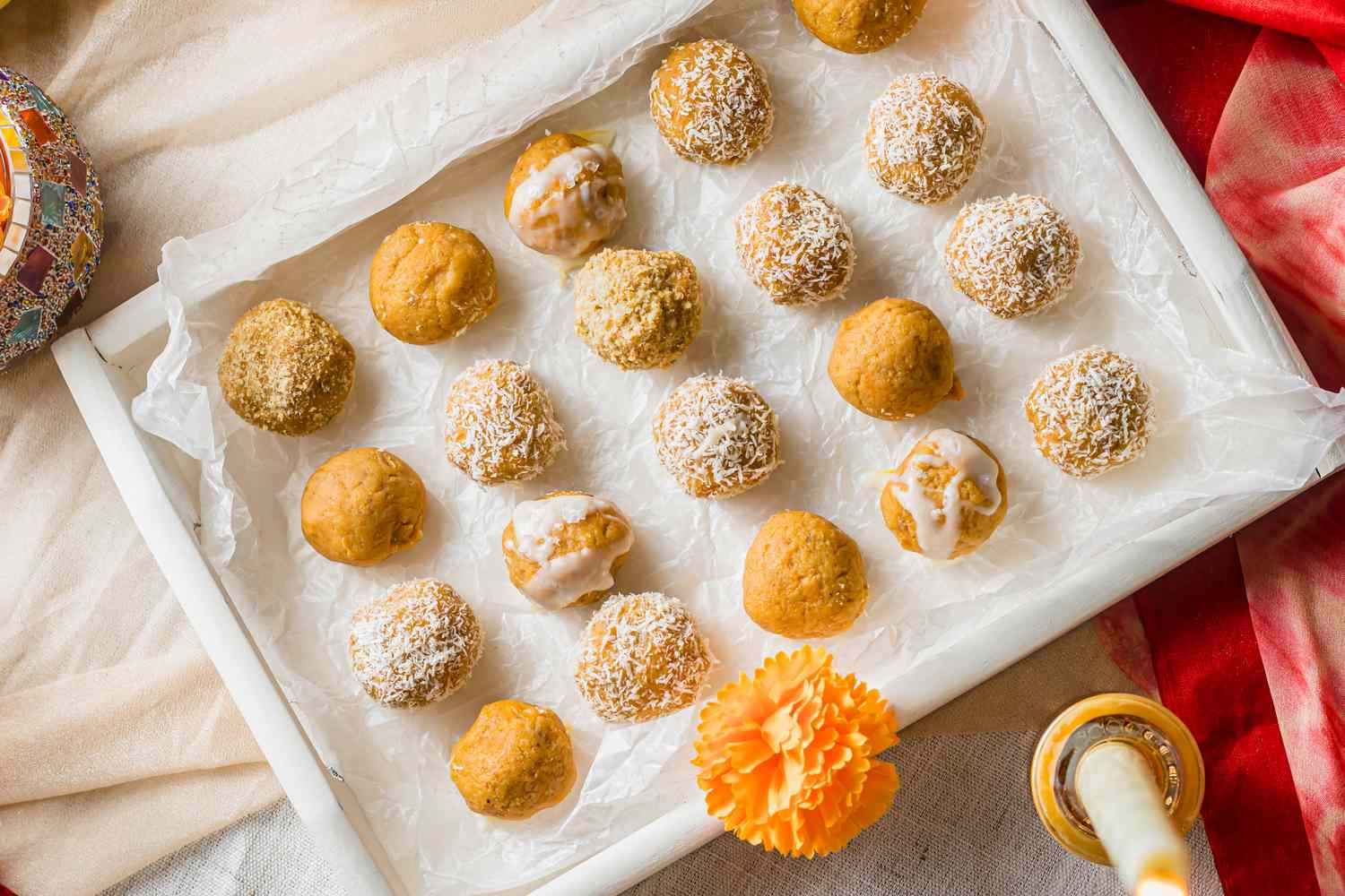 Pumpkin Ladoo on a Tray with Flowers