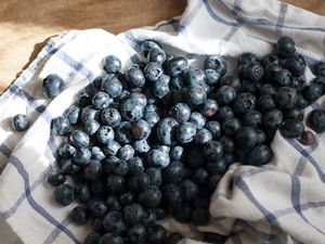 blueberries on a kitchen towel